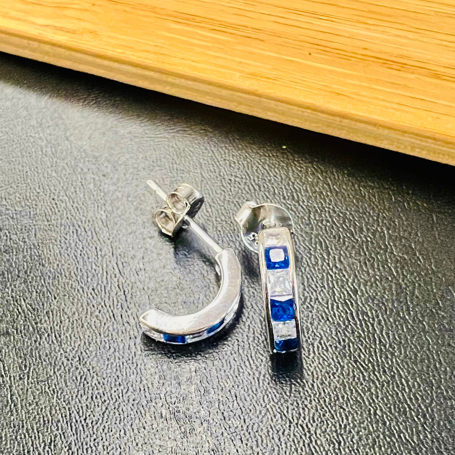 Sterling Silver Blue Half-hoop CZ Clear Studs Earrings