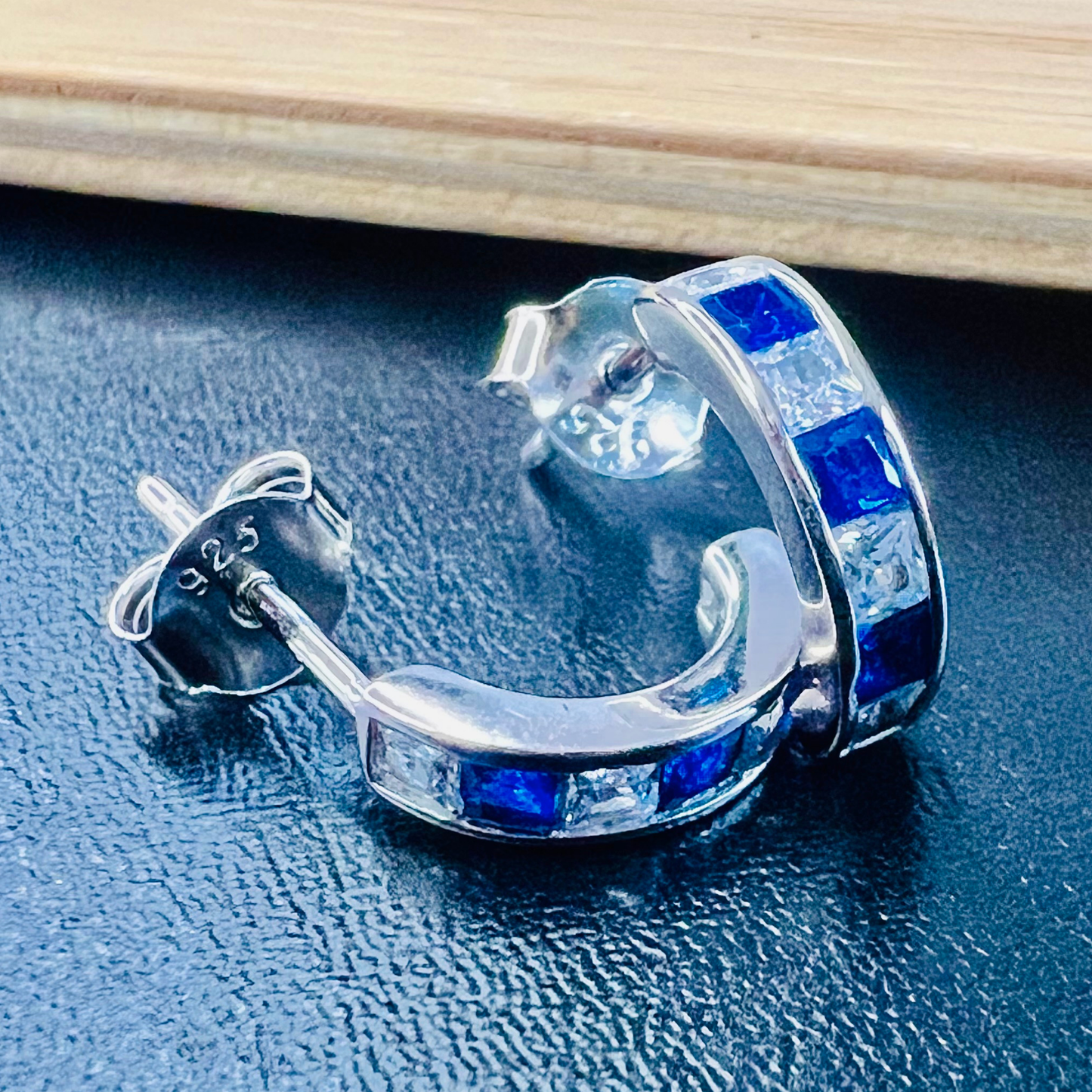Sterling Silver Blue Half-hoop CZ Clear Studs Earrings