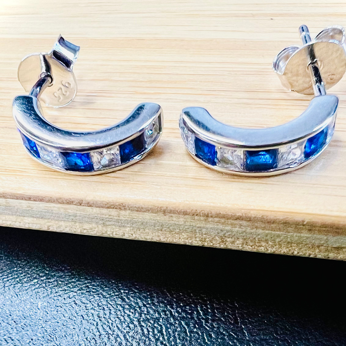 Sterling Silver Blue Half-hoop CZ Clear Studs Earrings