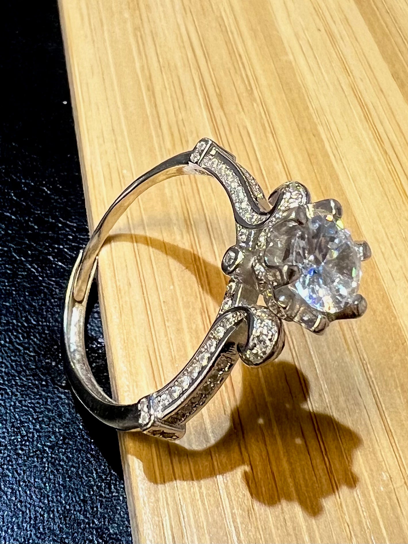 Sterling Silver Flexible Solitaire Engagement Ring with curved shoulders
