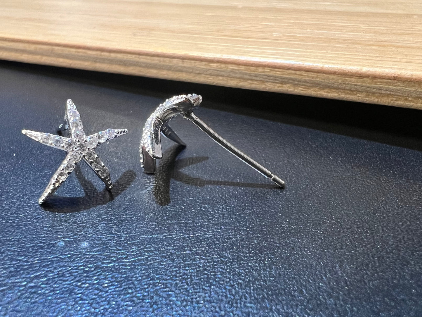 Sterling Silver Rhodium Plated Embossed Starfish CZ Studs Earrings