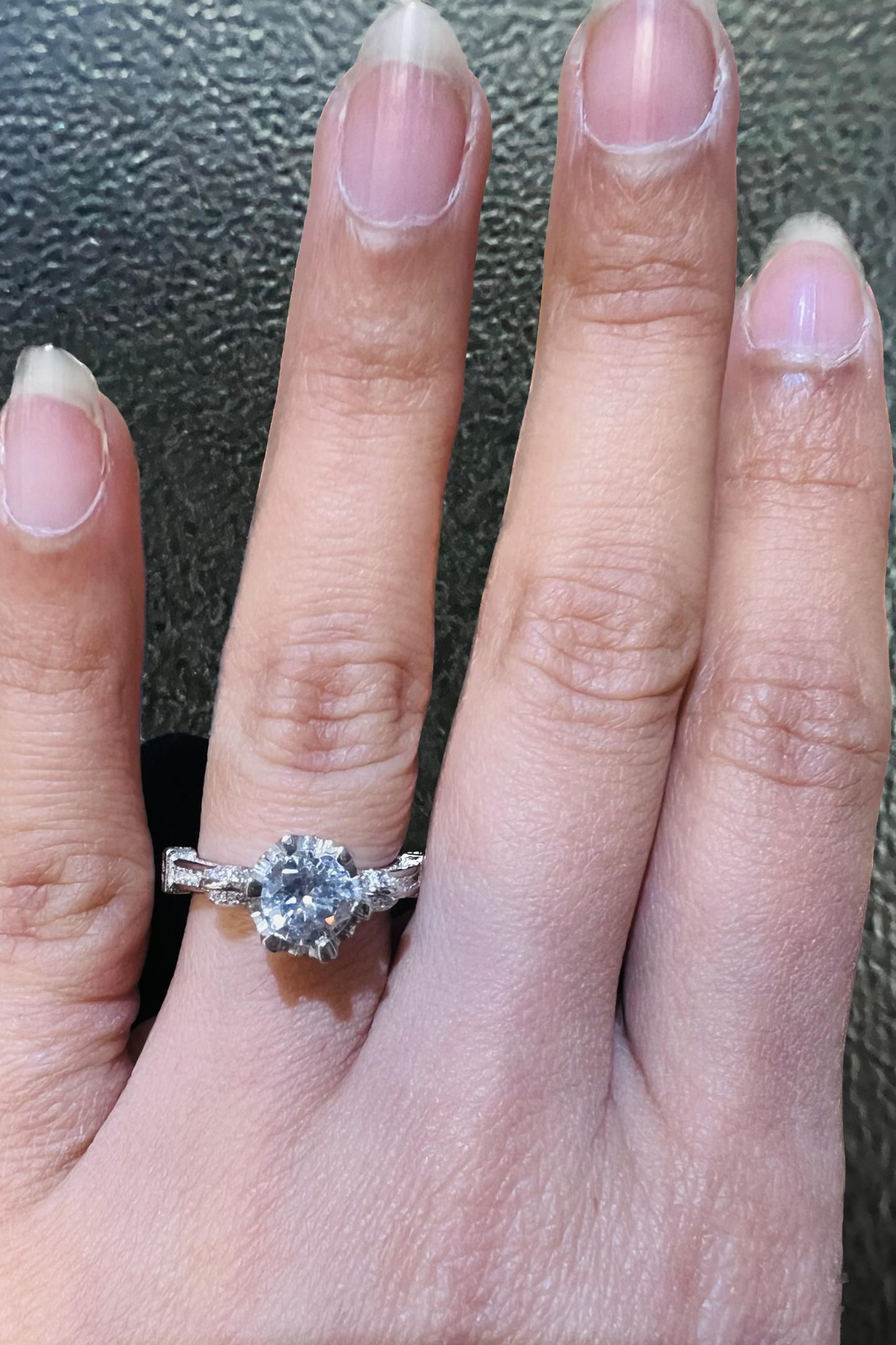 Sterling Silver Flexible Solitaire Engagement Ring with curved shoulders