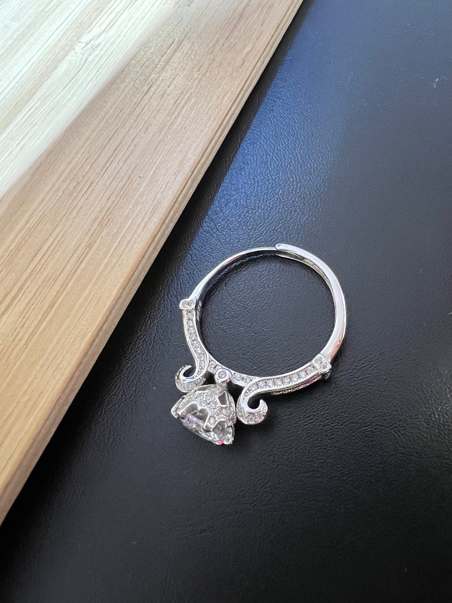 Sterling Silver Flexible Solitaire Engagement Ring with curved shoulders