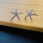 Sterling Silver Rhodium Plated Embossed Starfish CZ Studs Earrings