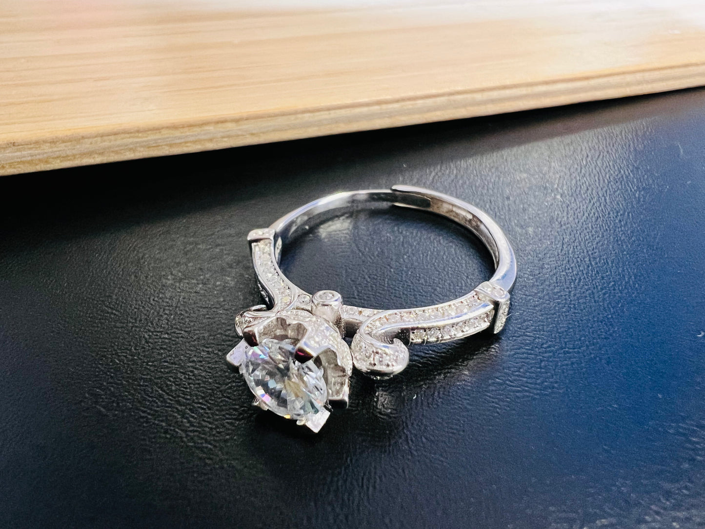 Sterling Silver Flexible Solitaire Engagement Ring with curved shoulders
